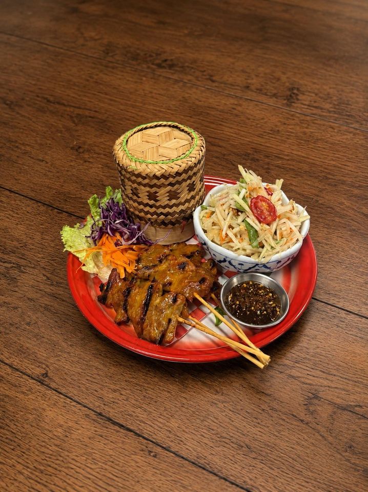 Moo Ping & The Gang grilled Thai pork skewers with sticky rice and papaya salad